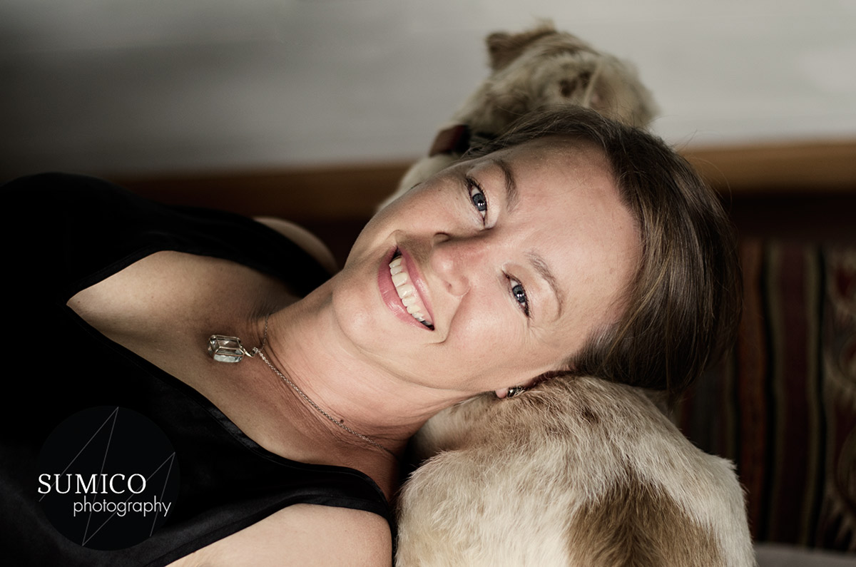 Dog and Woman by Sumico Photography