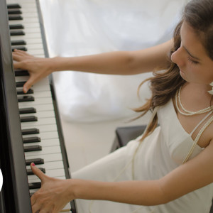 High School Senior playing piano High School Senior playing piano