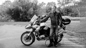 Portrait of man with his BMW bike