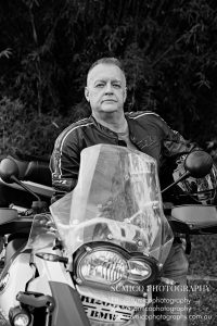 Men's portrait with motorbike