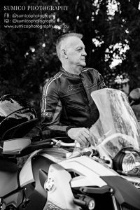 Portrait of man with his BMW bike